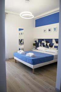 Postel nebo postele na pokoji v ubytování Filangieri 23 - Luxury B&B - Sorrento Coast
