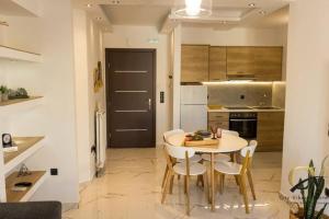 Kuchyň nebo kuchyňský kout v ubytování City Vibes apartment Preveza