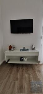 TV a/nebo společenská místnost v ubytování Apartmani Katarina