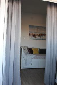 Postel nebo postele na pokoji v ubytování Apartmani Katarina