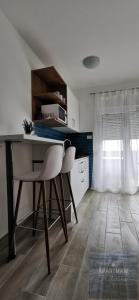 Kuchyň nebo kuchyňský kout v ubytování Apartmani Katarina