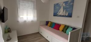 TV a/nebo společenská místnost v ubytování Apartmani Katarina