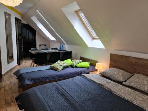 En eller flere senge i et værelse på Villa Slavia