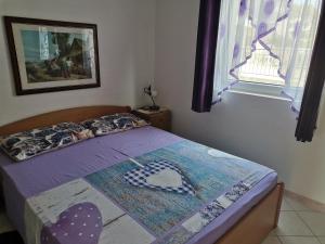 Postel nebo postele na pokoji v ubytování Villa Rosa