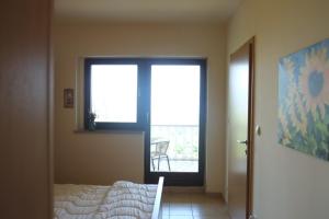 Ein Bett oder Betten in einem Zimmer der Unterkunft Hilltop Villa Risika
