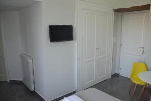 TV a/nebo společenská místnost v ubytování DC House