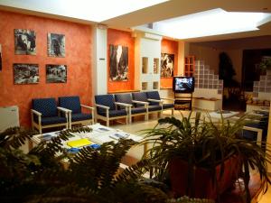 TV a/nebo společenská místnost v ubytování Kissamos Hotel