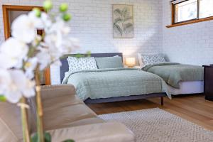 Area soggiorno di The Flaxman Studio - Panoramic Ocean Views