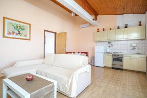 Kuchyň nebo kuchyňský kout v ubytování Apartments Ivka