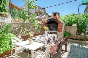Patio nebo venkovní prostory v ubytování Apartments Ivka