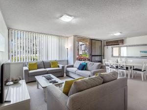 Posezení v ubytování Magnus Gardens 4 beautiful air conditioned unit with filtered water views and Wi-Fi