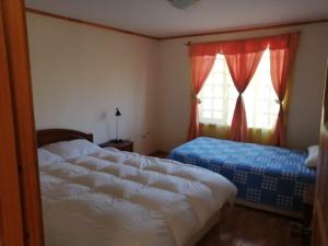 メリピージャにあるConectar con la naturaleza te hará más felizのベッド2台と窓のある寝室 +26枚の写真