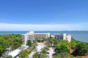 an aerial view of a building and the ocean at Garden Sea View Resort in Pattaya North