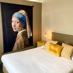 Postel nebo postele na pokoji v ubytování Logies Graaf Van Vlaanderen