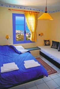 a bedroom with two beds and a window at Room in Studio - Suite 21 full view Adults Only in Hersonissos