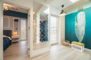 Posteľ alebo postele v izbe v ubytovaní Apartament Mimbelli