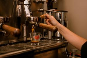 Coffee and tea making facilities at B&B Palazzo Storico Di Nicola