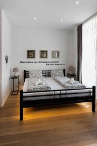 Кровать или кровати в номере Triangle Apartments