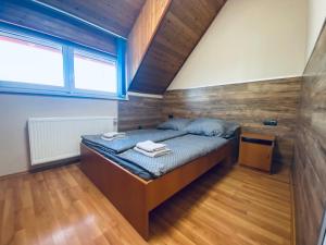 Postel nebo postele na pokoji v ubytování Panorama Resort Balatonfüred + 11 fotografií