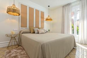 Posteľ alebo postele v izbe v ubytovaní Genteel Home Recogidas