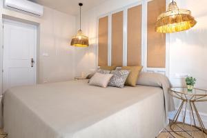 Posteľ alebo postele v izbe v ubytovaní Genteel Home Recogidas
