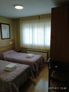 Postel nebo postele na pokoji v ubytování Borja