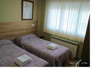 Postel nebo postele na pokoji v ubytování Borja