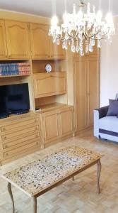 TV a/nebo společenská místnost v ubytování Apartment PER DAY