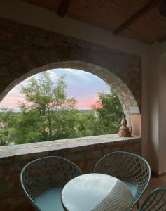 A balcony or terrace at Achelatis Traditional Guest Houses