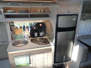 Kuchyňa alebo kuchynka v ubytovaní Apartamenty u Łukasza