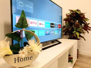 Telewizja i/lub zestaw kina domowego w obiekcie Sherryflat Cádiz