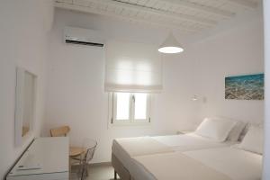Posteľ alebo postele v izbe v ubytovaní Nireas Apartments Mykonos Downtown