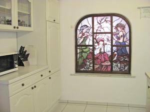 Kuchyň nebo kuchyňský kout v ubytování Apartment Storchenfärbe