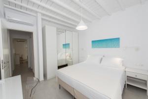 Posteľ alebo postele v izbe v ubytovaní Nireas Apartments Mykonos Downtown