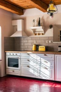 A kitchen or kitchenette at Domčok na Slnečnom Kopci