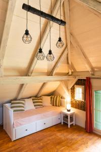 A bed or beds in a room at Domčok na Slnečnom Kopci