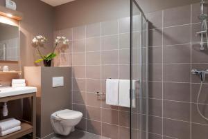 Nehô Suites Porte de Genève tesisinde bir banyo