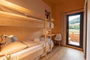 Posteľ alebo postele v izbe v ubytovaní Kreischberg Suites by ALPS RESORTS