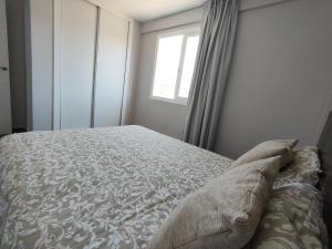 Łóżko lub łóżka w pokoju w obiekcie Apartamento Veracruz - Primera Linea de Playa