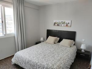Łóżko lub łóżka w pokoju w obiekcie Apartamento Veracruz - Primera Linea de Playa