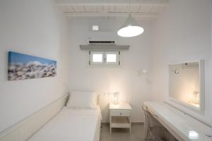 Posteľ alebo postele v izbe v ubytovaní Nireas Apartments Mykonos Downtown