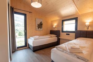 Posteľ alebo postele v izbe v ubytovaní Kreischberg Suites by ALPS RESORTS