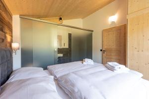 Posteľ alebo postele v izbe v ubytovaní Kreischberg Suites by ALPS RESORTS