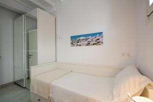 Posteľ alebo postele v izbe v ubytovaní Nireas Apartments Mykonos Downtown