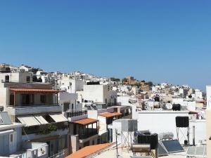 a view of a city with white buildings at Sitiahome in Sitia