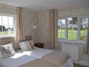 Postel nebo postele na pokoji v ubytování Trelawne Hotel