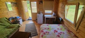 Postel nebo postele na pokoji v ubytování Laasi-Jaani Holiday Homes