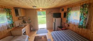 TV a/nebo společenská místnost v ubytování Laasi-Jaani Holiday Homes
