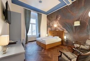 Postel nebo postele na pokoji v ubytování Boutique Hotel Dom - Rooms & Suites + 28 fotografií