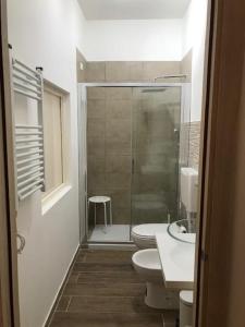 Ένα μπάνιο στο affittacamere alloggio olivo